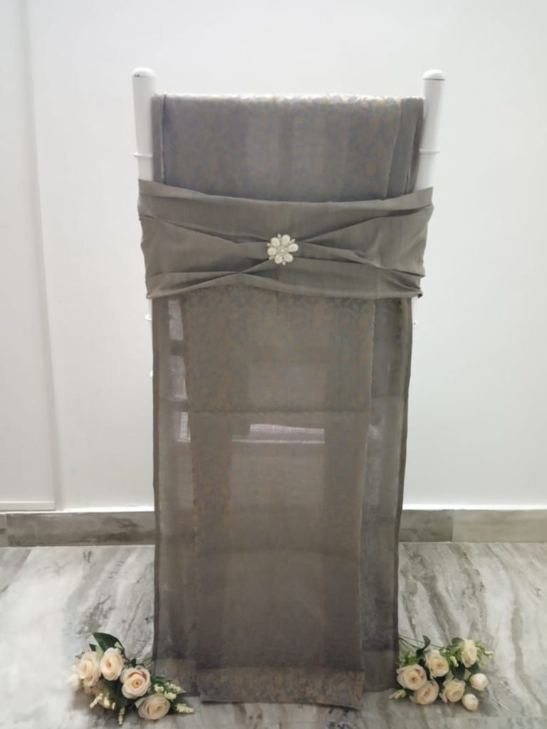 Grey jaquard chair cover with matching bow