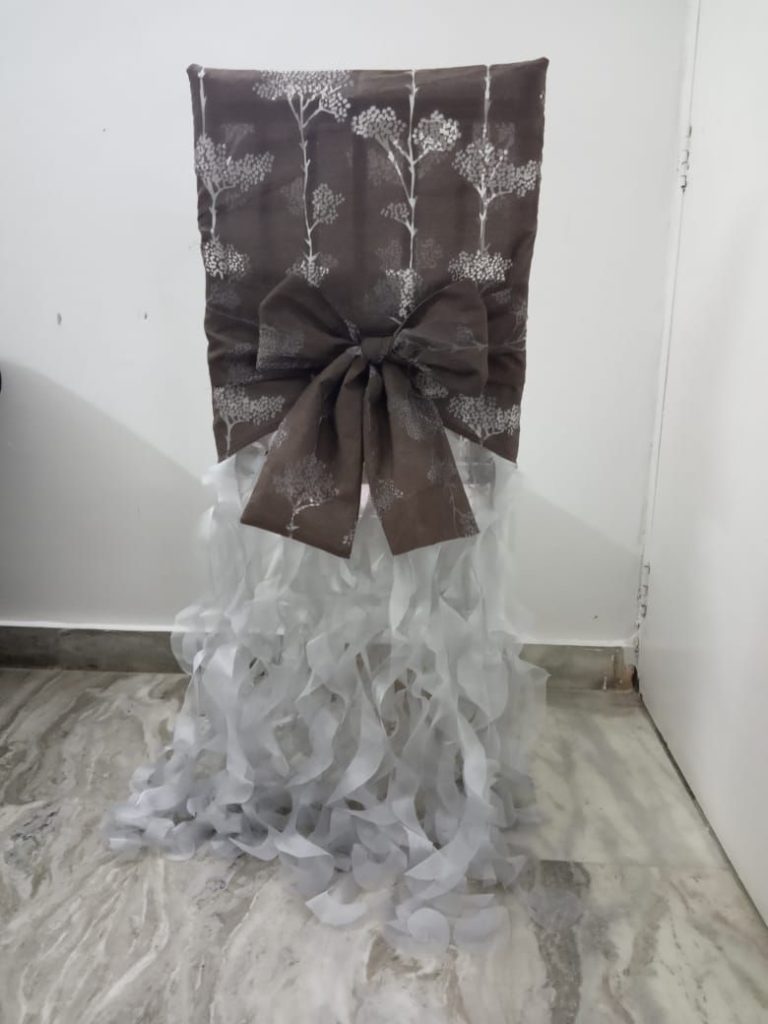 Brown flocking cap and bow with silver ruffles