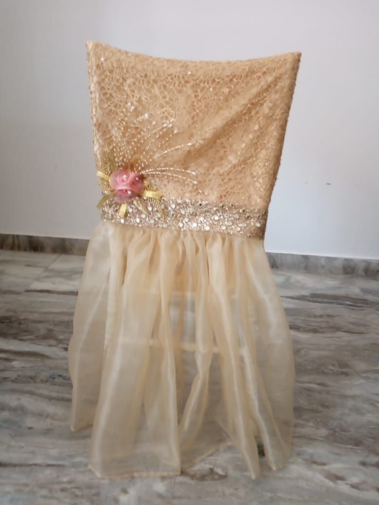 Golden ghinza top with organza bottom chair cover
